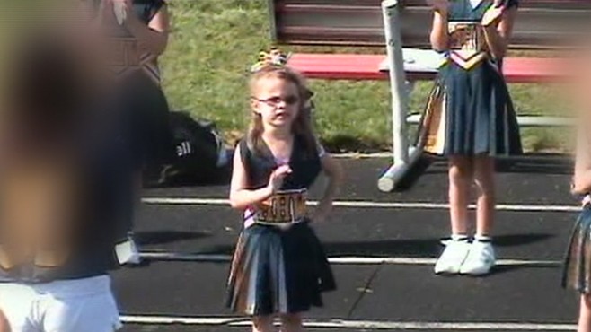 VIDEO: Daughter booted from the squad after mom voices concerns about the chants.