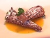 Cannoli With Orange Sauce and Pistachios