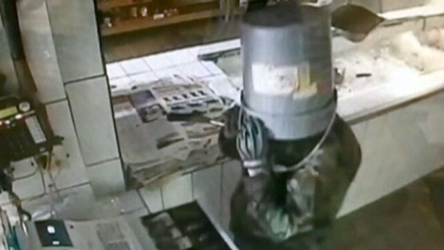 VIDEO: Bucket-Wearing Burglar Caught on Tape