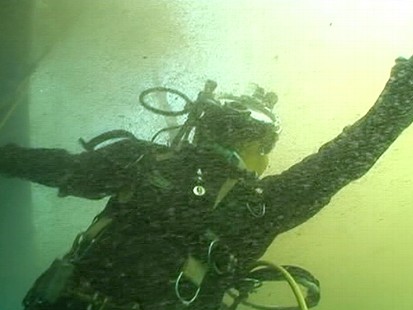 VIDEO: Philippe Cousteau Jr. and Sam Champion take hazmat dive into Gulfs oily waters.
