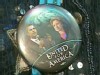 A picture of a button showing Barack Obama and Hillary Clinton.
