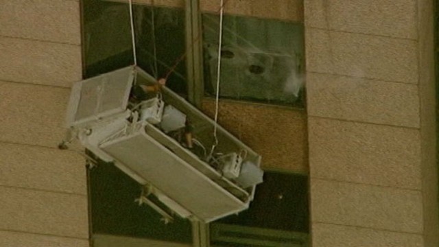 VIDEO: The two workers were stuck hanging from the 42nd floor for one hour.