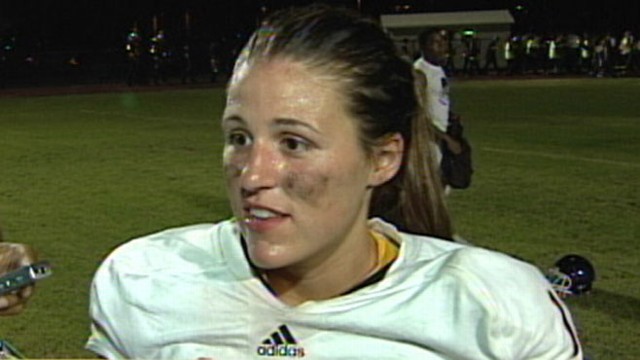VIDEO: Female breaks gender barrier when she leads her high school football team.