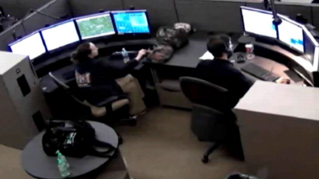 VIDEO:Video shows a 911 operator on her phone when she was supposed to be overseeing a trainee.