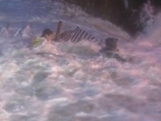Watch: Hurricane Sandy: Reporter, Producer Hit by Storm Wave