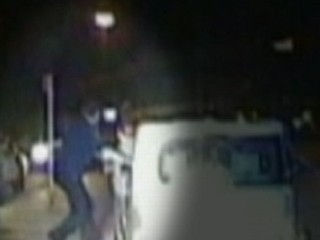Watch: Hero Cop Pushes Woman from Path of Car: Caught on Tape