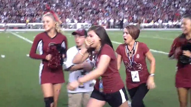 VIDEO: Sergeant First Class Scott Faile surprises family during halftime show at the U. of South Carolina.