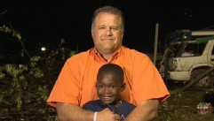 VIDEO: Hug between first grader Hezekiah Darbon and his neighbor