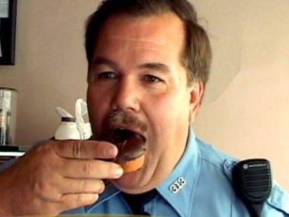 VIDEO: Police force buys and operates local bakery to save store from going under.