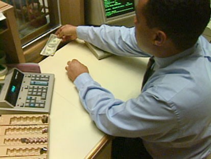 A picture of a bank teller.