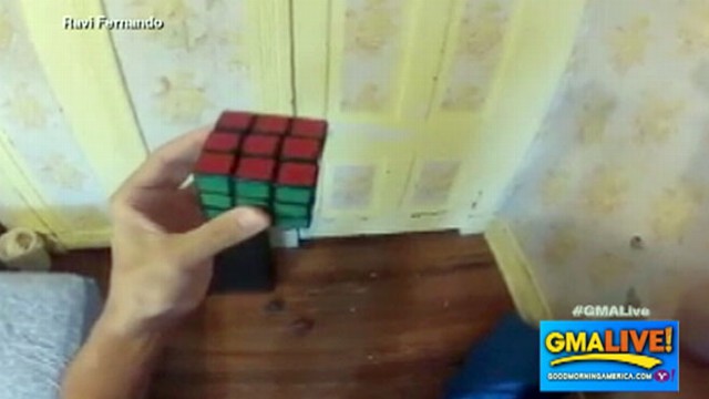 guy solves 3 runix cubes while juggling