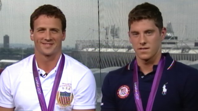 VIDEO: Gold medalist joins fellow athletes in capitalizing on their first-place finishes.