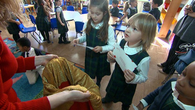 VIDEO: A class of first-graders writes letters to Santa to help make sick childrens dreams come true.