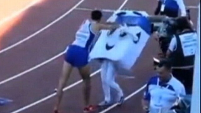 VIDEO: French Runner Wins Race, Shoves Mascot