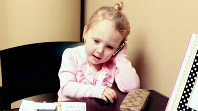 VIDEO: Toddlers take on the life and times of a busy, working gal goes viral online.