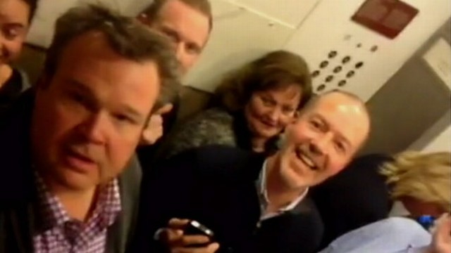 VIDEO: John Muller reports the stars reactions to being stuck in jam-packed elevator.
