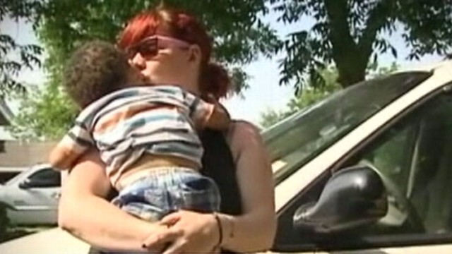 Video: Mother Protects Kids from Carjacker