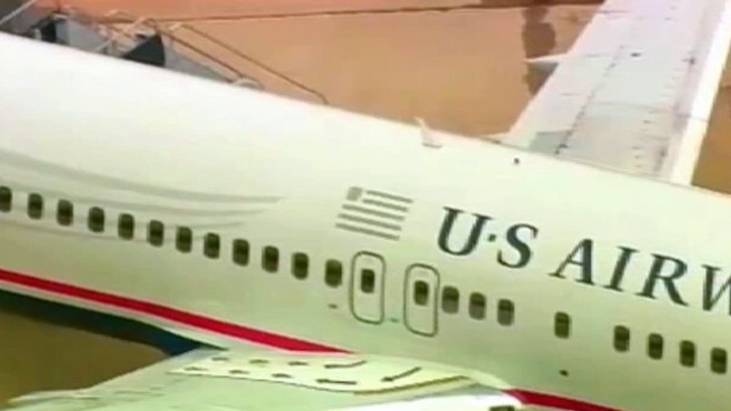 VIDEO: US Airways pilot discovers a hole in his plane before takeoff.