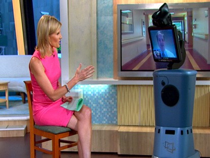 PHOTO Good Morning America Weekend anchor meets with neurologist Dr. Paul Vespa of the Ronald Reagan UCLA Medical Center using the RP7i robot.