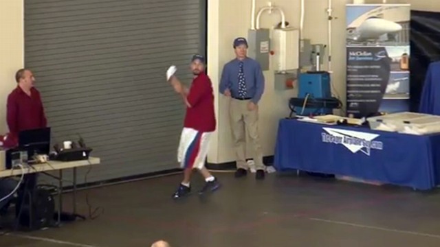VIDEO: Joe Ayoob threw a specially-designed paper airplane 226 feet, 10 inches.