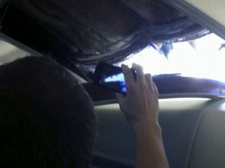 | Hole Rips in Roof of Plane |