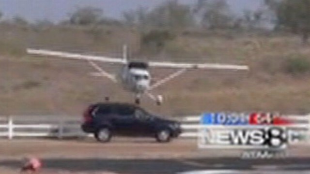 VIDEO: SUV Clipped by Incoming Airplane