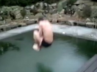Watch: 'Ice Dude' Tries to Cannonball in Frozen Pool in YouTube Video