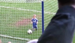 VIDEO: Soccer goalie's son slowly makes his way to the net during a teammate's farewell speech.