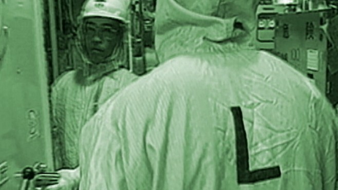 VIDEO: Firefighters spray down Fukushima reactor in hopes of preventing a meltdown.
