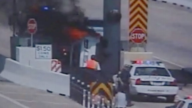 VIDEO: Dramatic video shows Texas driver rescued by a stranger near a toll booth.