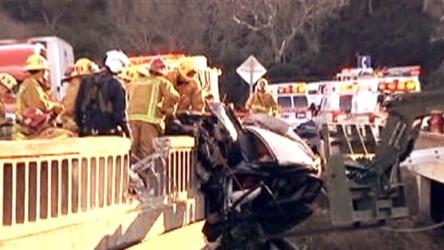 VIDEO: Rescue workers saved mother and two kids trapped in car hanging off a bridge.