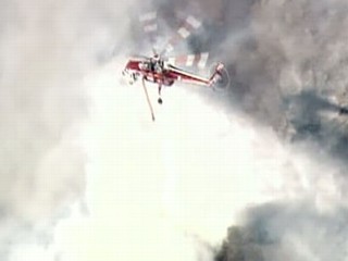 Calif. Wildfires Threaten Thousands Of Homes