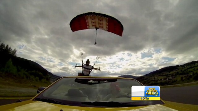 VIDEO: Daredevil Katie Hansen precisely matches speed of car with decent to stick impossible landing.