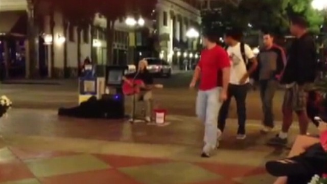 VIDEO: Singer draws a big crowd on San Diego street but an even bigger audience online.