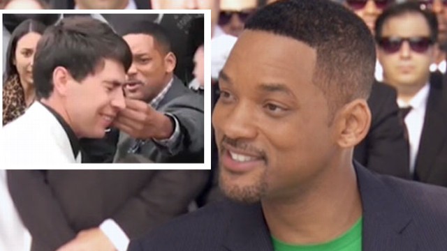 VIDEO: Actor says Ukrainian journalist went too far after Smith agreed to a hug.