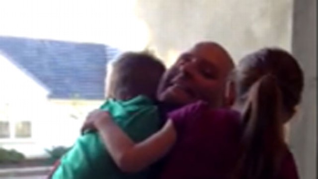 VIDEO: Staff Sergeant Joshua Durrer surprised his kids by popping out of present delivered by Santa.