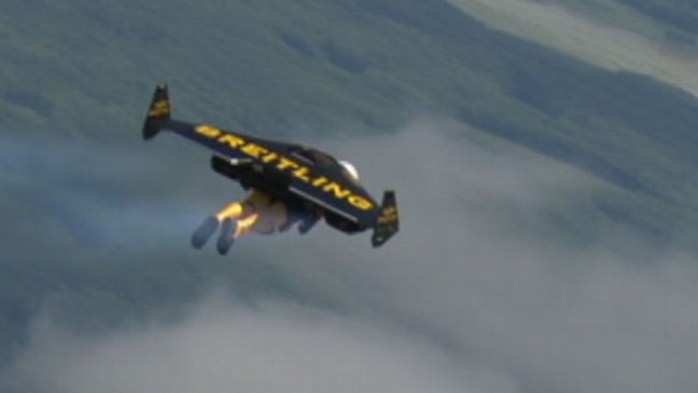 VIDEO: Yves Rossy wowed fans at an air show flying 4500 feet in his jet propelled wing suit.