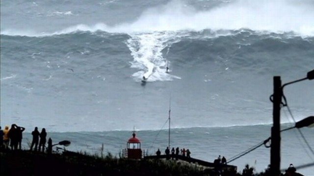 VIDEO: Carlos Burle may have made history by riding the biggest wave on record.