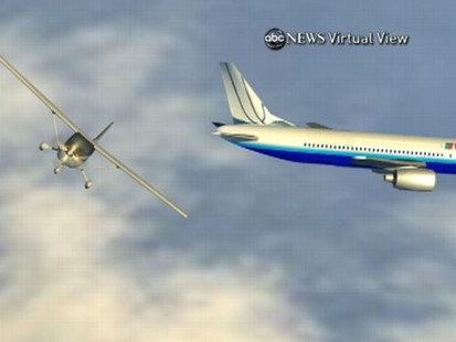 VIDEO: Small plane comes within 300-feet of colliding midair with a packed jumbo jet.