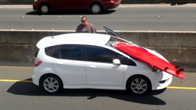 VIDEO: Surfboard Pierces Drivers Windshield
