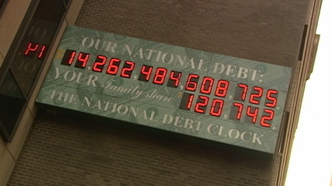 VIDEO: Federal budget battle settles but national debt clock continues to tick.