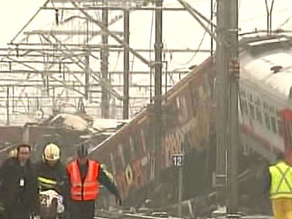 VIDEO: At least 25 people are killed during rush-hour head-on collision.