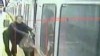 VIDEO: A commuter is dragged by a moving train when the doors close on her handbag.