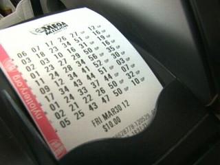 Watch: Woman Finally Cashes in Winning Lotto Ticket