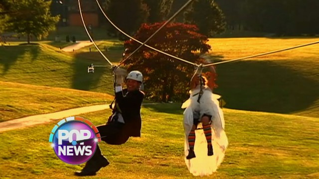 VIDEO: Lauren and Ben made an unforgettable entrance to their ceremony -- on zip lines.