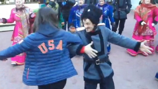 VIDEO: U.S. skiers Keri Herman and Devin Logan with Cossack dancers.