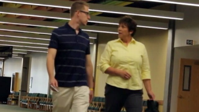 VIDEO: In a prank video, Andrew Hales goes up to total strangers and holds their hands.