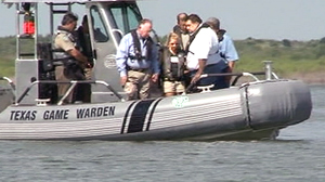 PHOTO Tiffany Hartley returned for the first time to the location where she said her husband was killed