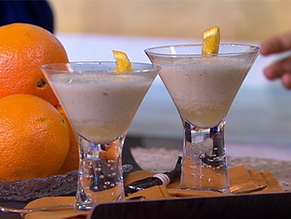 Kewl blended orange vanilla bean creamsicles are shown.