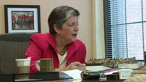 Janet Napolitano at her desk.
